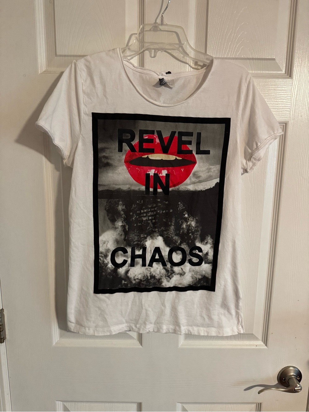 Divided White Short-Sleeve Tee with Bold 'Revel in Chaos' Graphic